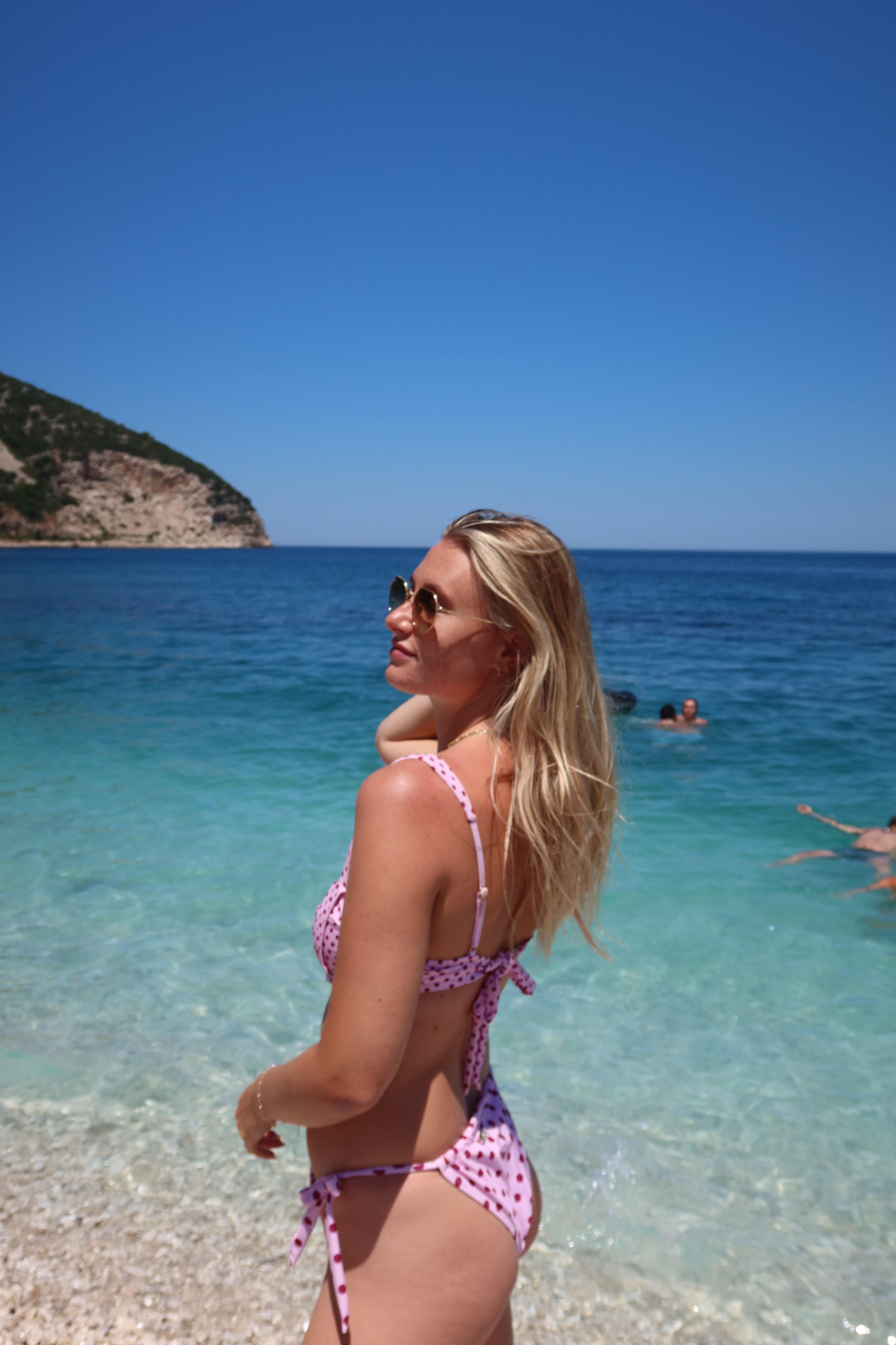 Emily Victoria travels in vlore on a boat trip in albania